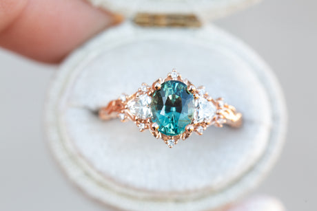 Briar rose three stone with 1.58ct green teal sapphire