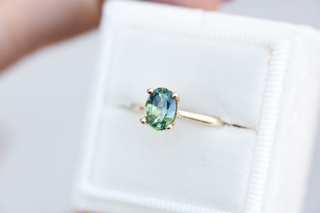 The Elora setting with oval teal green sapphire
