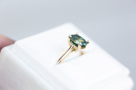 The Elora setting with oval teal green sapphire