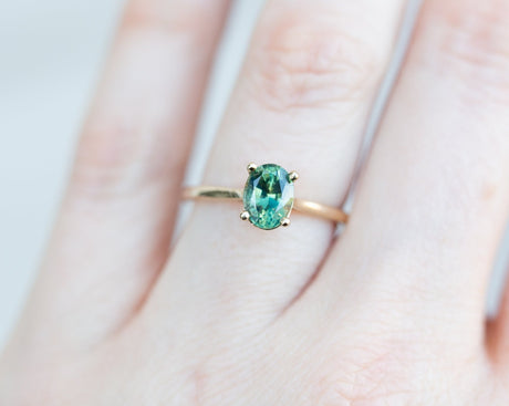 The Elora setting with oval teal green sapphire