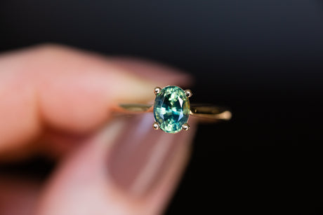 The Elora setting with oval teal green sapphire