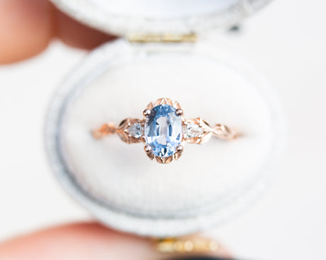 Wisteria with oval blue sapphire