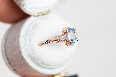 Wisteria with oval blue sapphire