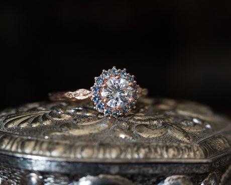Moissanite and aquamarine halo midsummer ring