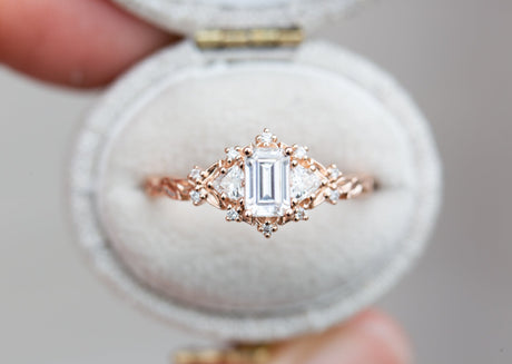 Briar rose three stone with 6x4mm emerald cut moissanite