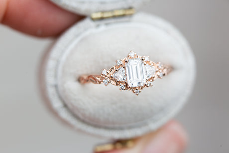 Briar rose three stone with 6x4mm emerald cut moissanite