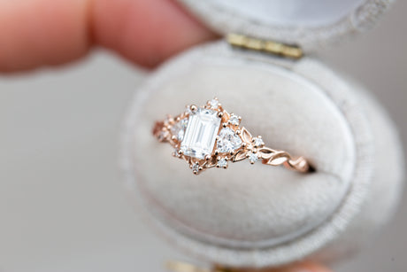 Briar rose three stone with 6x4mm emerald cut moissanite