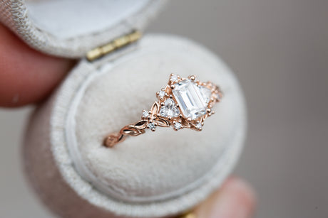 Briar rose three stone with 6x4mm emerald cut moissanite