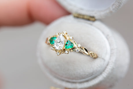 Briar rose three stone with pear moissanite and lab emerald (fairy queen ring)