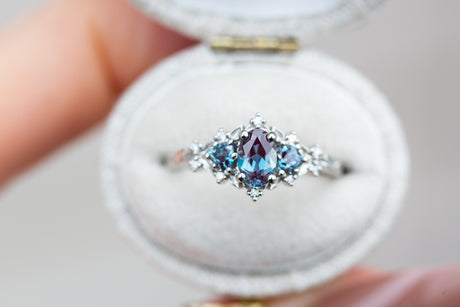 Briar rose three stone with oval alexandrite and alexandrite side stones