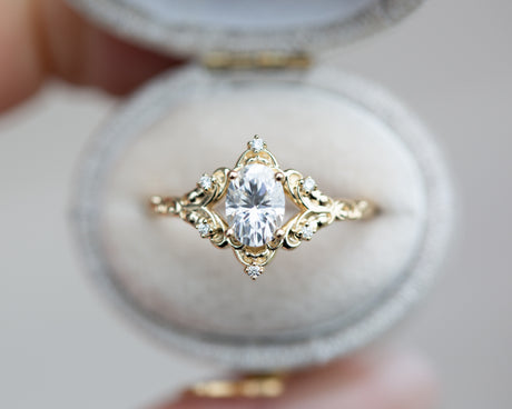 The Aurora setting with oval moissanite