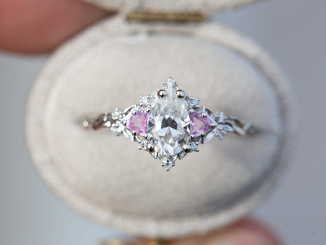 Briar rose three stone with pear moissanite and pink sapphire