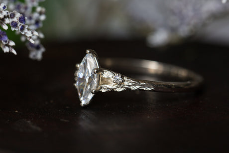 Marquise moissanite leaf cathedral engagement ring