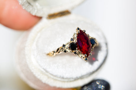 Briar rose three stone with marquise lab ruby and black diamonds