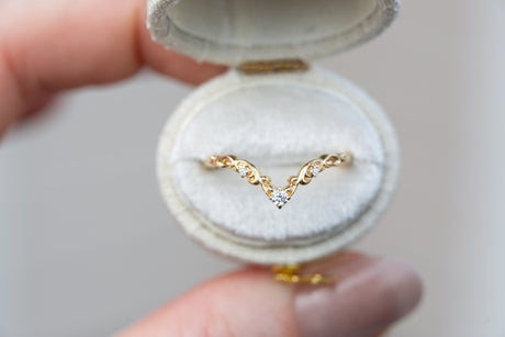 Curved filigree wedding band