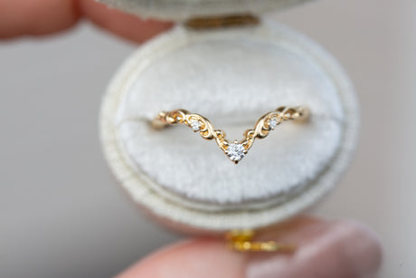 Curved filigree wedding band