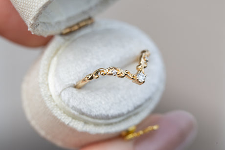 Curved filigree wedding band