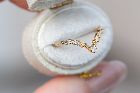 Curved filigree wedding band