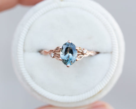 Oval grey spinel leaf ring