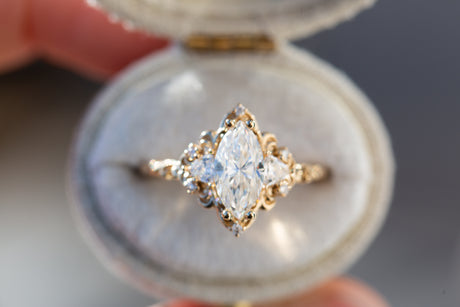 Aurora three stone with marquise moissanite