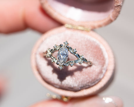 Briar rose setting with natural white diamond center stone