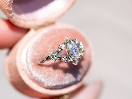 Briar rose setting with natural white diamond center stone