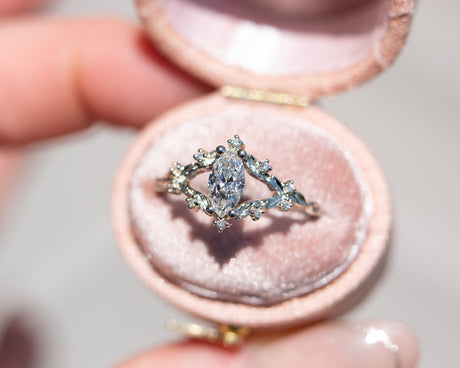 Briar rose setting with natural white diamond center stone