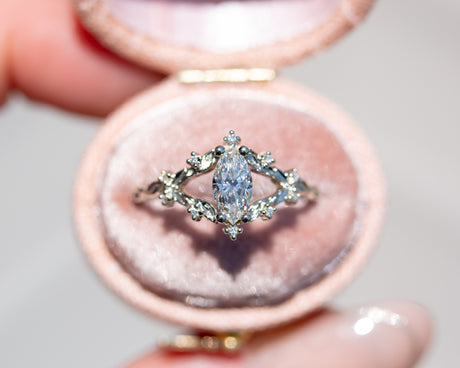 Briar rose setting with natural white diamond center stone