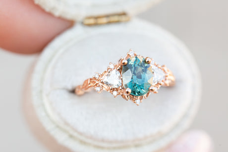 Briar rose three stone with 1.58ct green teal sapphire