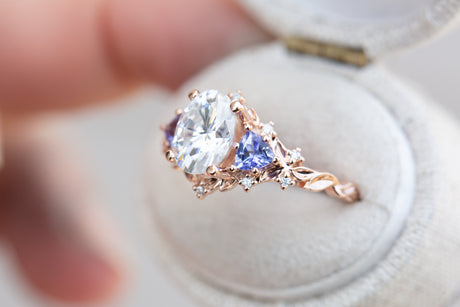 Briar rose three stone with 8x6mm oval moissanite and tanzanite