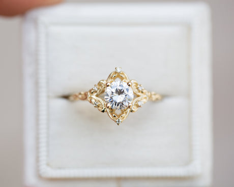 Aurora setting with 6mm round moissanite