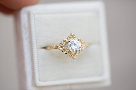 Aurora setting with 6mm round moissanite