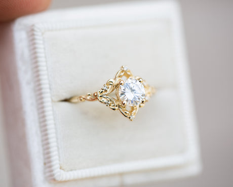 Aurora setting with 6mm round moissanite