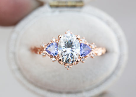Briar rose three stone with 8x6mm oval moissanite and tanzanite