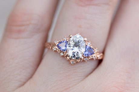 Briar rose three stone with 8x6mm oval moissanite and tanzanite