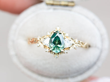 Briar rose three stone with pear teal moissanite