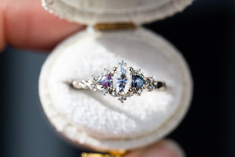 Briar rose three stone with 6x4mm oval moissanite and alexandrite