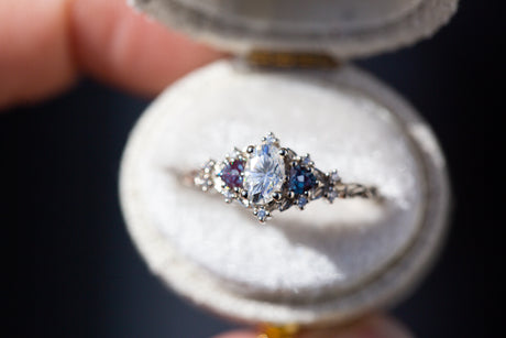 Briar rose three stone with 6x4mm oval moissanite and alexandrite