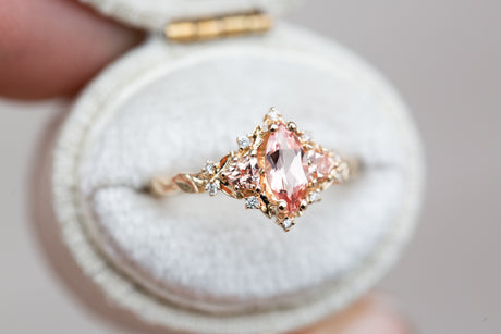 Briar rose three stone with marquise peach sapphire