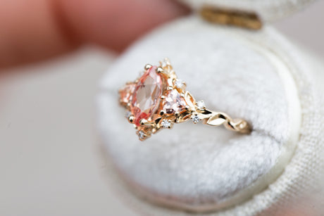 Briar rose three stone with marquise peach sapphire
