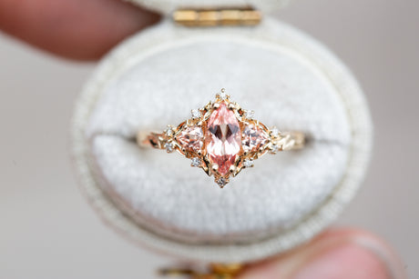 Briar rose three stone with marquise peach sapphire