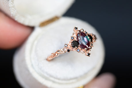 Briar rose three stone with 8x4mm marquise lab alexandrite and black diamonds