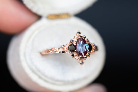 Briar rose three stone with 8x4mm marquise lab alexandrite and black diamonds