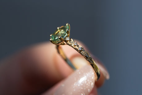 Rowan setting with oval lab green sapphire