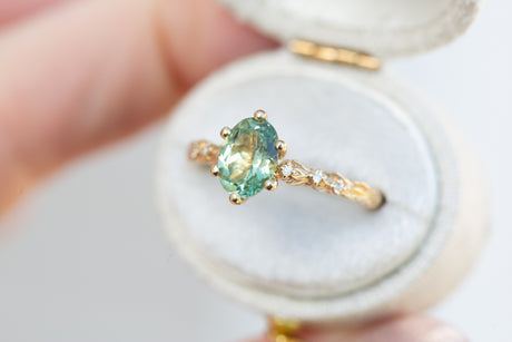 Rowan setting with oval lab green sapphire