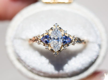Briar rose three stone with marquise moissanite and tanzanite