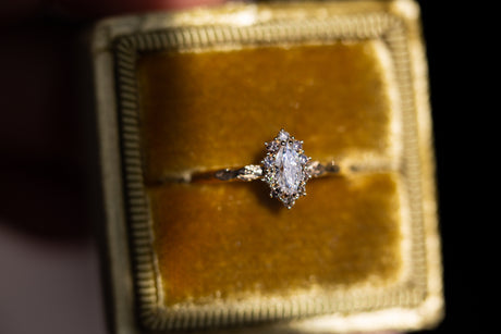 Midsummer Petite setting with marquise center and champagne diamonds