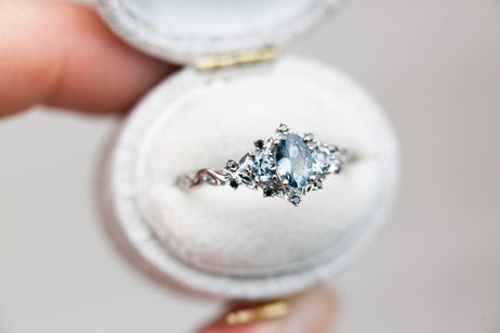 Briar rose three stone with grey spinel and black diamonds
