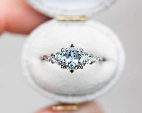 Briar rose three stone with grey spinel and black diamonds