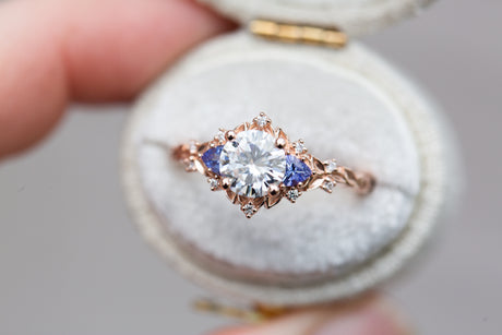 Briar rose three stone with round moissanite and tanzanite